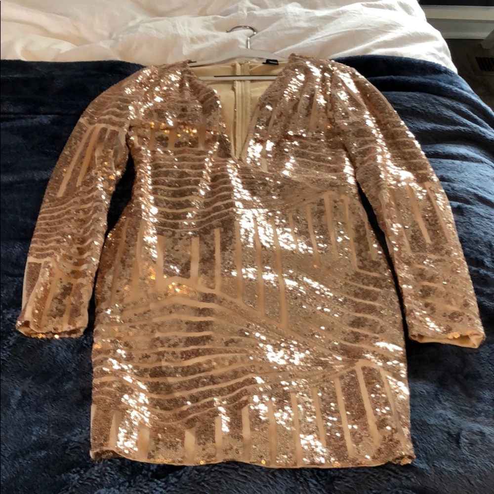New Years dress sparkles low cut long sleeve